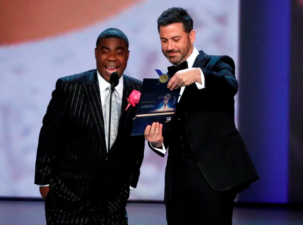 FILE PHOTO: 70th Primetime Emmy Awards - Show - Los Angeles, California, U.S., 17/09/2018 - Presenters Tracy Morgan and Jimmy Kimmel for Outstanding Lead Actress in a Comedy series REUTERS/Mario Anzuoni/File Photo
