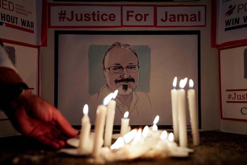 The Committee to Protect Journalists and other press freedom activists hold a candlelight vigil in front of the Saudi Embassy to mark the anniversary of the killing of journalist Jamal Khashoggi at the kingdom’s consulate in Istanbul in Washington, U.S, Oct 2, 2019. — Reuters