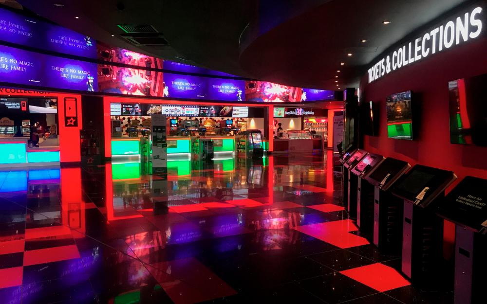 FILE PHOTO: General view of an empty cinema foyer at Cineworld in Hemel Hempstead as the number of coronavirus cases grow around the world, in Hemel Hempstead, Britain, March 17, 2020. REUTERS/Matthew Childs/File Photo