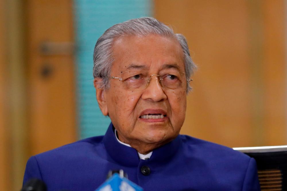 Mahathir urges Malaysians to be resilient, not resort to suicide