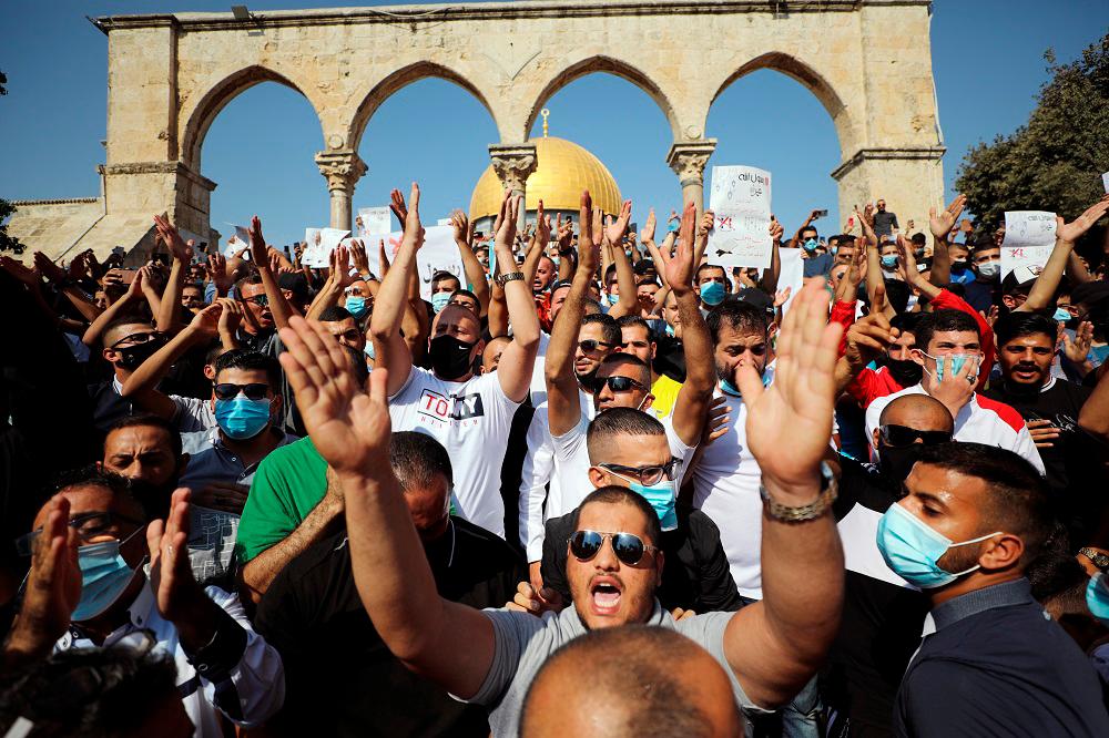 Palestinians protest against France following Friday prayers on the compound known to Muslims as Noble Sanctuary and to Jews as Temple Mount in Jerusalem’s Old City October 30, 2020. — Reuters