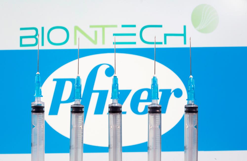 Britain today became the first country in the world to approve the Pfizer-BioNTech Covid-19 vaccine for use. — Reuters