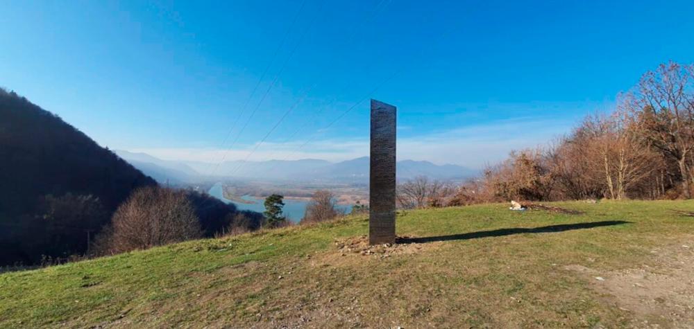A metal monolith stands on the hills of Batca Doamnei, near Piatra Neamt, Romania, November 27, 2020. Picture taken November 27, 2020. Inquam Photos/ziarpiatraneamt.ro via REUTERS