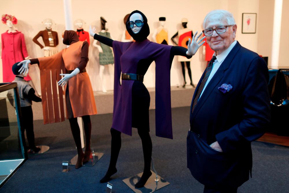 $!FILE PHOTO: French fashion designer Pierre Cardin poses in front of his fashion creations in his museum called “Past-Present-Future” in Paris November 12, 2014. REUTERS/Charles Platiau/File Photo