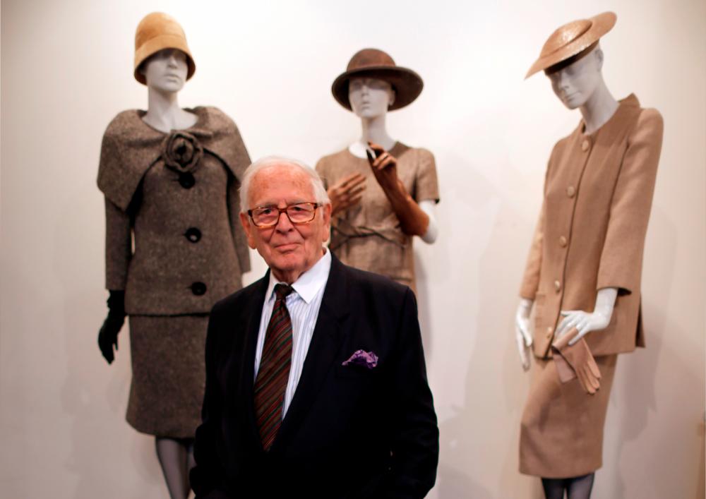 $!FILE PHOTO: French fashion designer Pierre Cardin poses in front of his 1954-1956-1957 fashion creations in his museum called “Past-Present-Future” in Paris November 12, 2014. REUTERS/Charles Platiau/File Photo