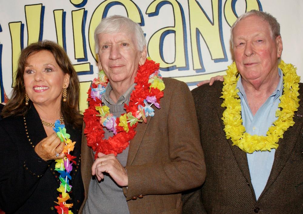 FILE PHOTO: Dawn Wells, Bob Denver and Russell Johnson (L-R), cast members in “Gilligan’s Island,“ pose during a launch party for “Gilligan’s Island: The Complete First Season,“ which will debut on DVD February 3, 2004 in Marina Del Rey, California. The popular television series marks its 40th anniversary with the DVD release, which includes a rarely seen pilot episode. REUTERS/Jim Ruymen JR/JES/File Photo