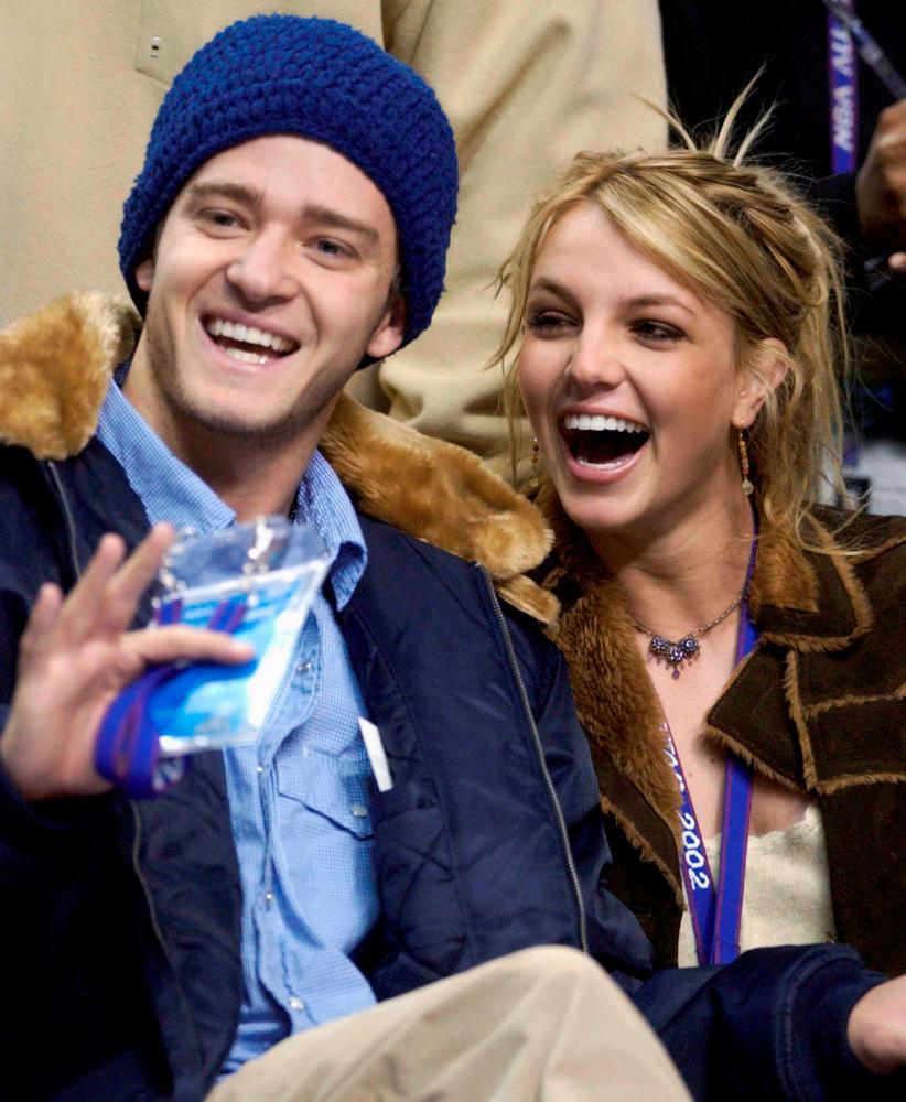 FILE PHOTO - Singer Britney Spears and boyfriend singer Justin Timberlake of NSYNC at the 2002 NBA All-Star game at the Philadelphia Convention Center, Pennsylvania U.S. February 10, 2002. REUTERS/Tim Shaffer/File Picture