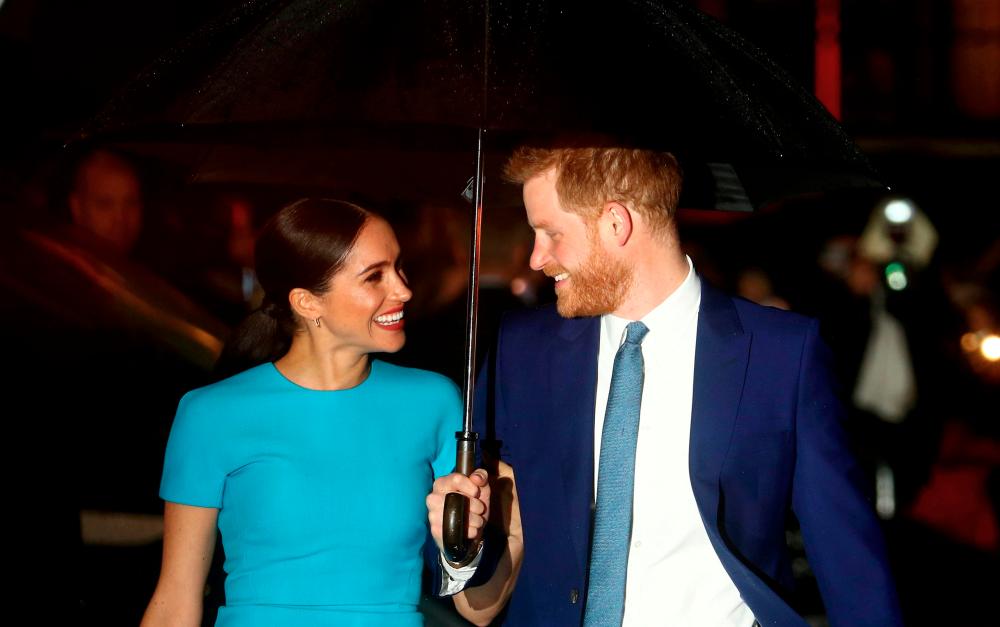 FILE PHOTO: Britain’s Prince Harry and his wife Meghan, Duchess of Sussex, arrive at the Endeavour Fund Awards in London, Britain, March 5, 2020. - Reuters