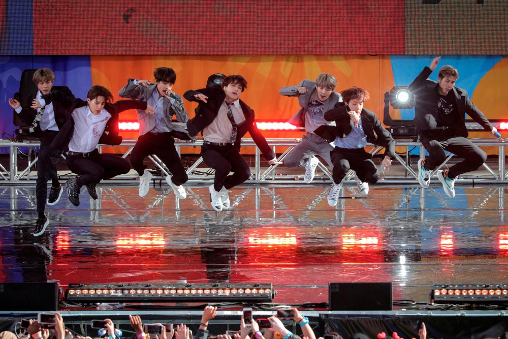 FILE PHOTO: Members of K-Pop band BTS perform on ABC’s ‘Good Morning America’ show in Central Park in New York City, U.S., May 15, 2019. -REUTERS
