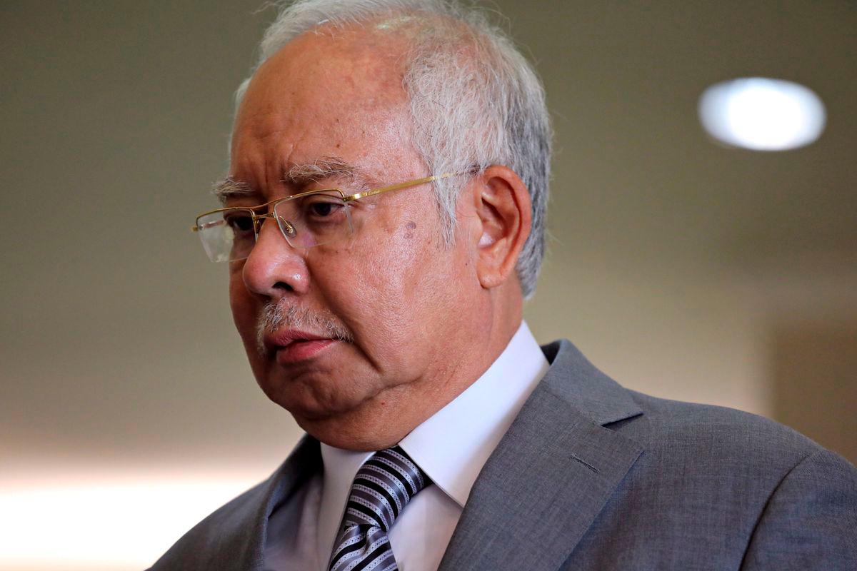 Former Malaysian Prime Minister Najib Razak reacts during a break at Kuala Lumpur High Court in Kuala Lumpur, Malaysia, February 5, 2020. - REUTERS