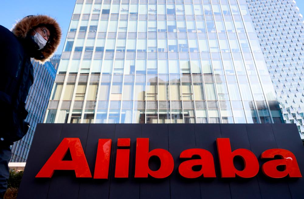 FILE PHOTO: The logo of Alibaba Group is seen at its office in Beijing, China January 5, 2021. –Reuters