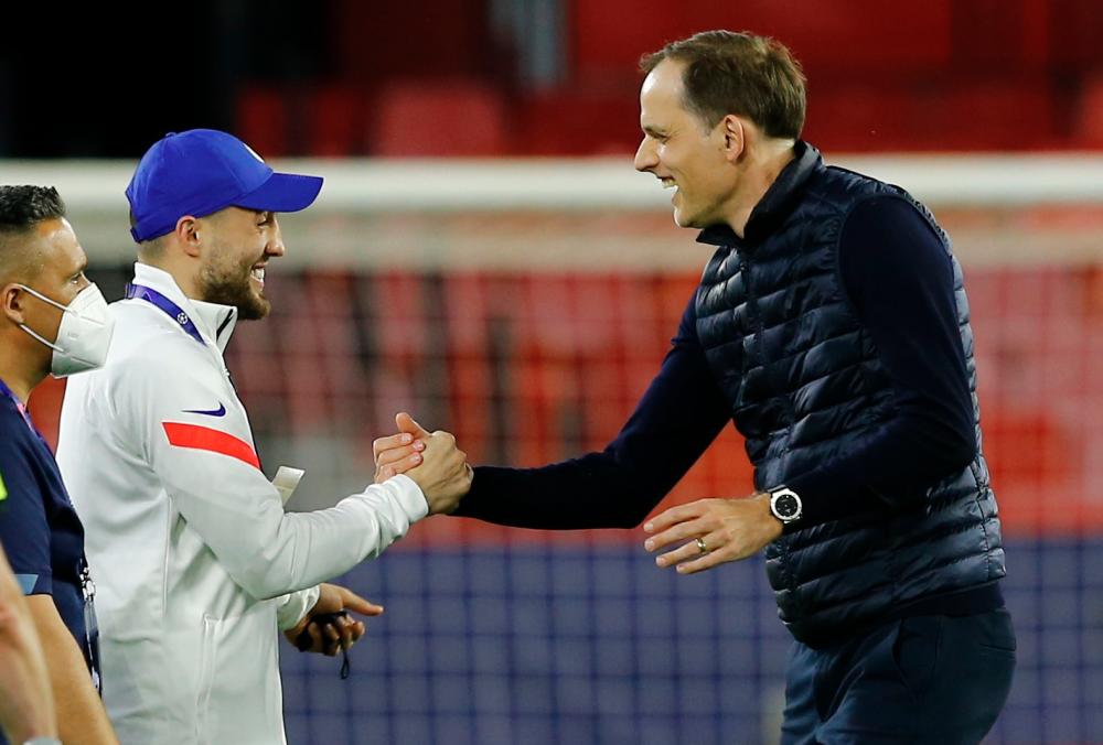 Chelsea manager Thomas Tuchel (right) shakes hands with Mateo Kovacic after Champions League quarterfinal second leg match against Porto. – REUTERSPIX