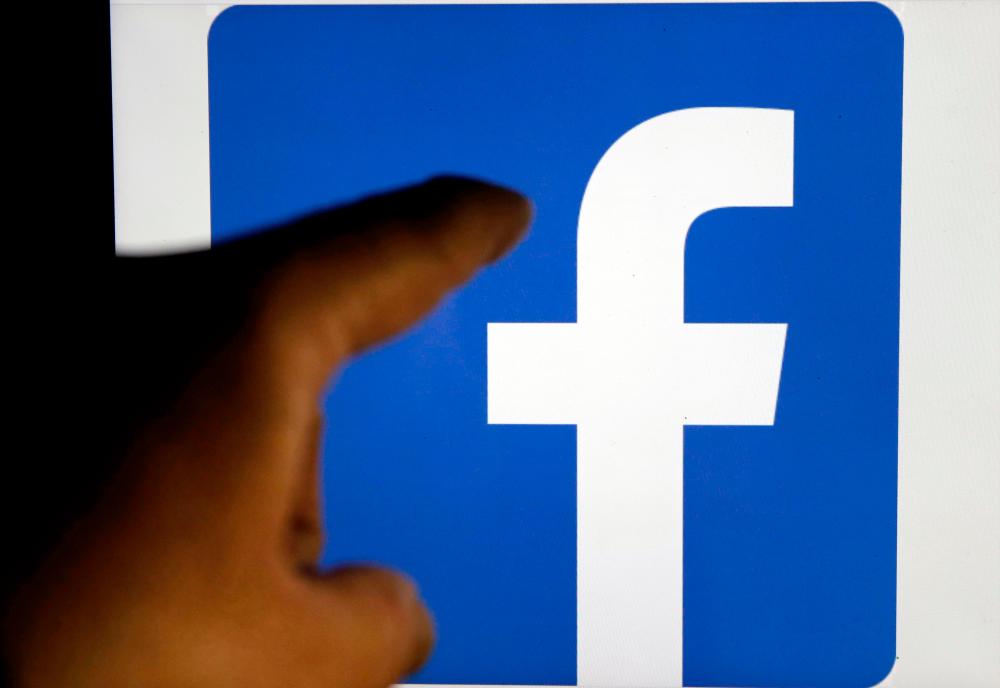 FILE PHOTO: A Facebook logo is pictured in Bordeaux, southwestern France, March 10, 2016. –Reuters