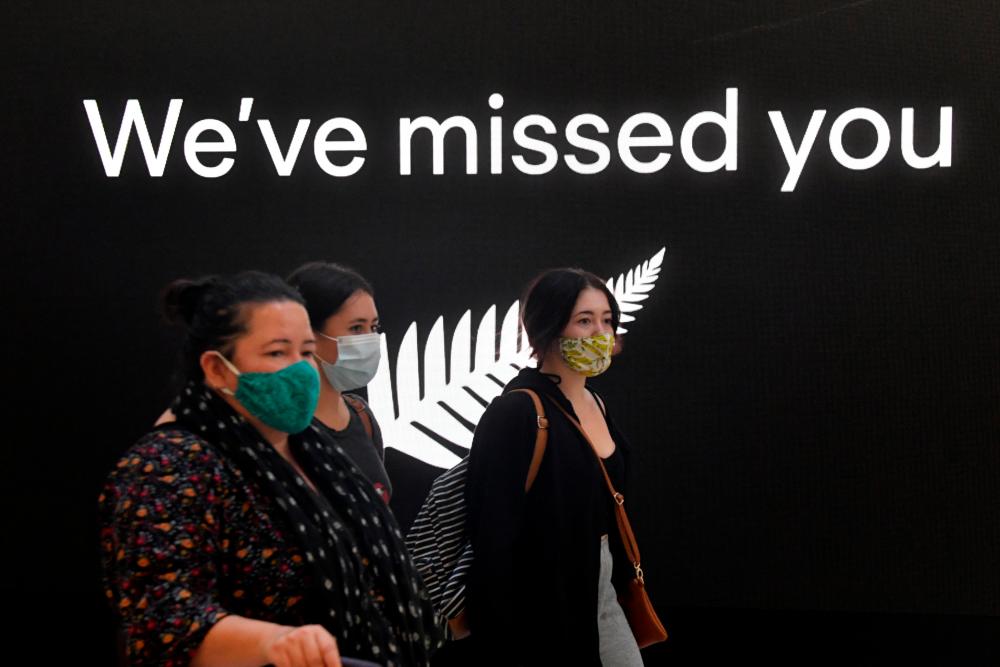 New Zealand travellers arrive at Sydney International Airport, as quarantine-free travel between Australia and New Zealand begins, in Sydney, Australia, April 19, 2021. –Reuters