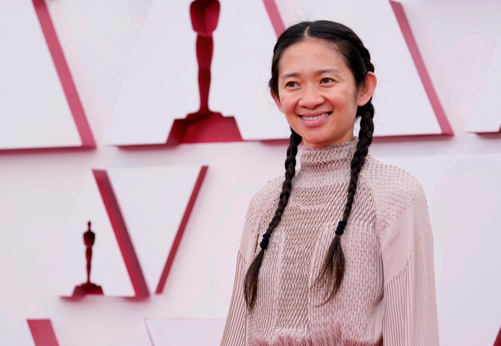Chloe Zhao arrives at the 93rd Academy Awards, at Union Station, in Los Angeles, US, April 25, 2021. - Reuters