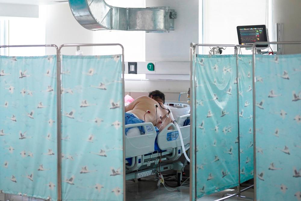 A patient suffering from the coronavirus disease (Covid-19) in the Intensive Care Unit (ICU) is seen at the King Chulalongkorn Memorial Hospital in Bangkok, Thailand, May 11, 2021. Picture taken May 11, 2021. - Reuters
