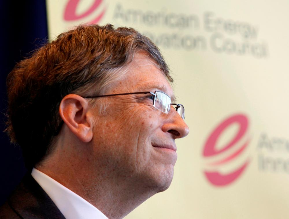 FILE PHOTO: Microsoft Chairman Bill Gates listens during a news conference with fellow US executives about their group’s recommendations to Congress and the president to revolutionize US energy innovation at the Newseum in Washington June 10, 2010. - Reuters