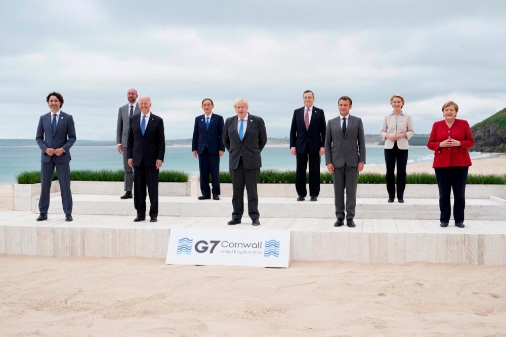Canadian Prime Minister Justin Trudeau, European Council President Charles Michel, US President Joe Biden, Japan’s Prime Minister Yoshihide Suga, British Prime Minister Boris Johnson, Italy’s Prime Minister Mario Draghi, French President Emmanuel Macron, European Commission President Ursula von der Leyen and German Chancellor Angela Merkel (from left to right) pose for a group photo at the G7 summit, in Carbis Bay, Britain, June 11, 2021. — Reuters