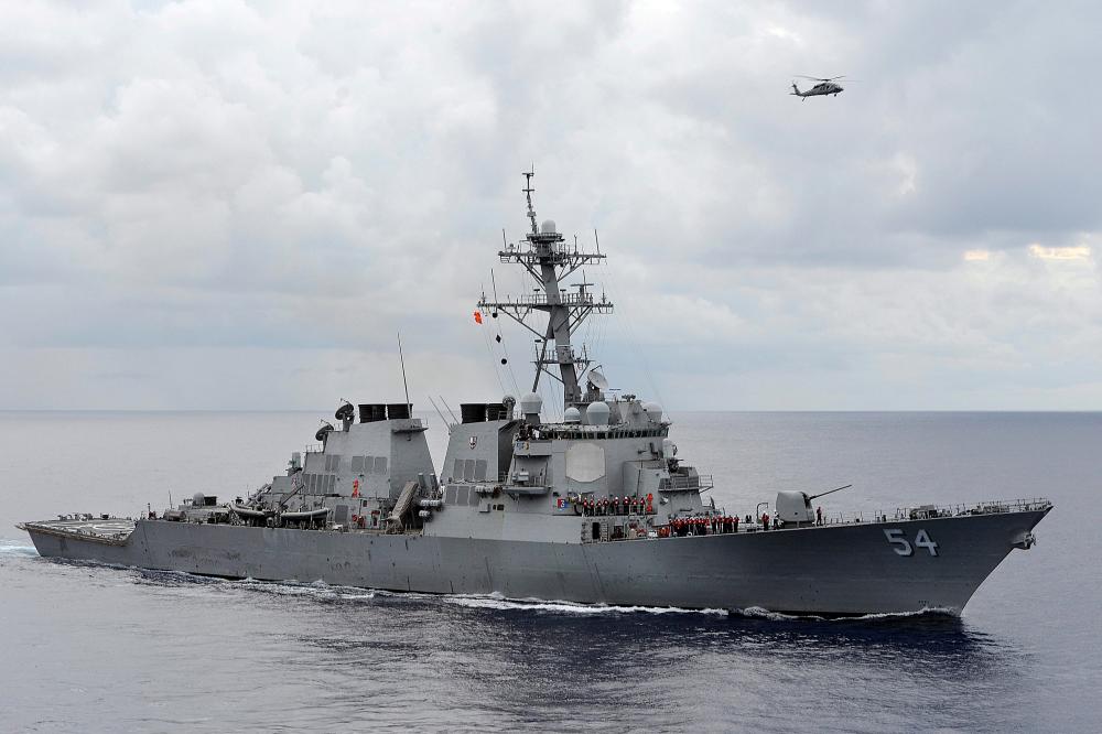 FILE PHOTO: The U.S. Navy guided-missile destroyer USS Curtis Wilbur patrols in the Philippine Sea in this August 15, 2013 file photo. -Reuters/ US Navy