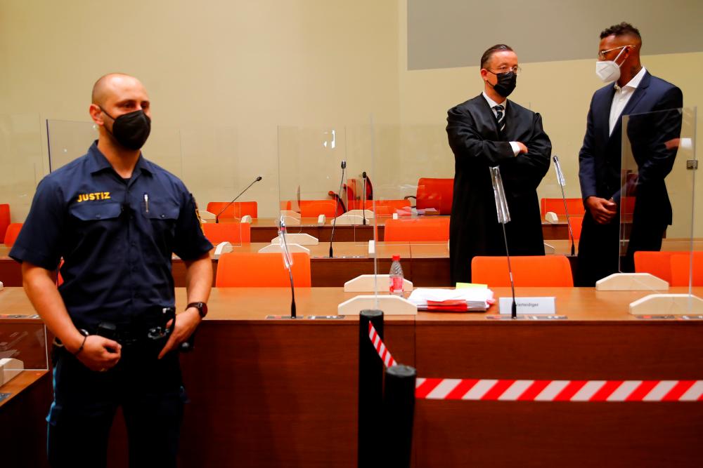 Former Bayern Munich central defender Jerome Boateng, who just signed with Olympique Lyonnais, speaks with attorney Kai Walden at his trial at a regional court, accused of bodily harm, as German media report he injured an ex-girlfriend during a fight, in Munich, Germany. – REUTERSPIX