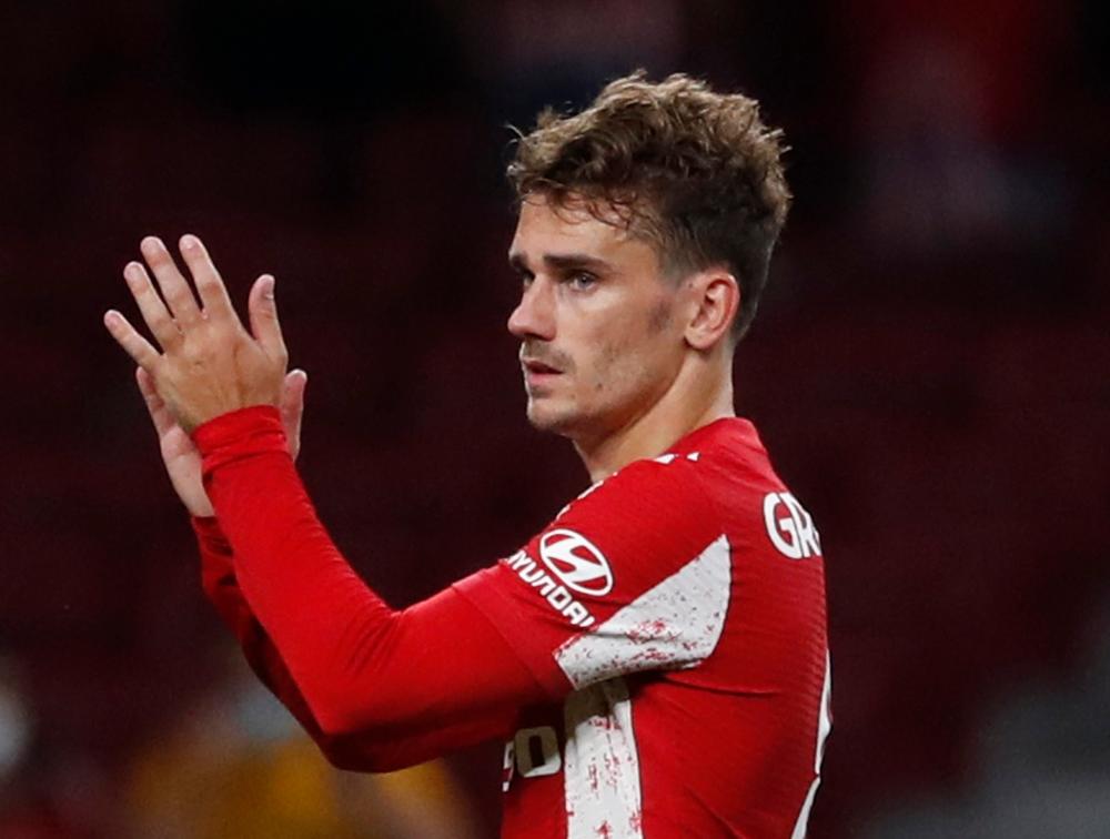 Mixed reception for Griezmann as Atletico given late scare by Porto