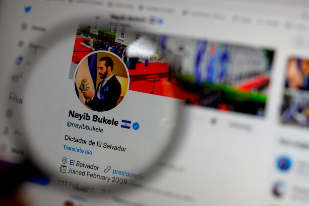 The twitter profile of El Salvador’s President Nayib Bukele reading ‘Dictator of El Salvador’ is seen on a computer screen in this photo illustration, September 20, 2021. REUTERSpix