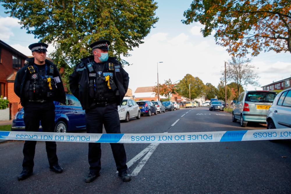 Police officers are seen at the scene where MP David Amess was stabbed during constituency surgery, in Leigh-on-Sea, Britain October 15, 2021. REUTERSpix
