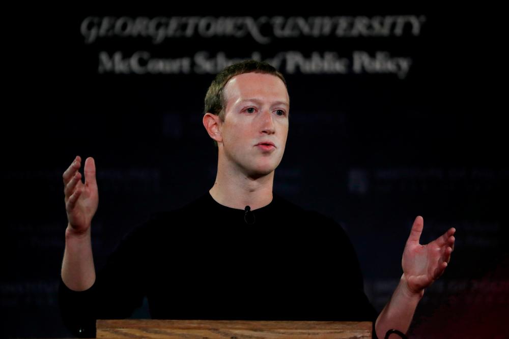 Facebook Chairman and CEO Mark Zuckerberg addresses the audience on “the challenges of protecting free speech while combating hate speech online, fighting misinformation, and political data privacy and security,“ at a forum hosted by Georgetown University’s Institute of Politics and Public Service (GU Politics) and the McCourt School of Public Policy in Washington, US, October 17, 2019. REUTERSpix