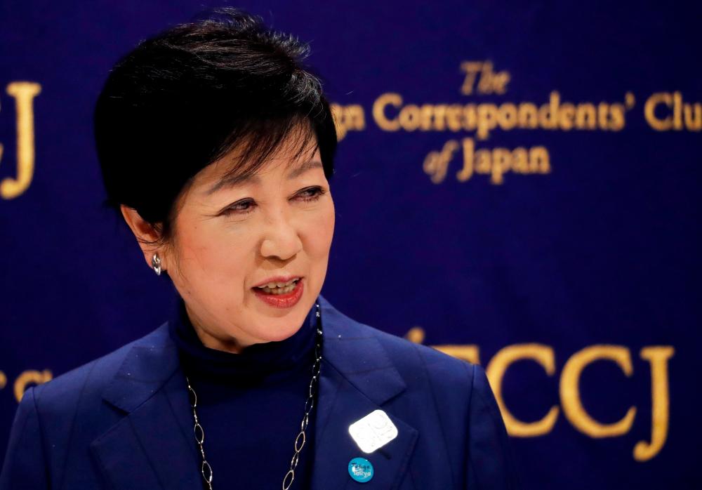 FILE PHOTO: Tokyo Governor Yuriko Koike attends a news conference, amid the coronavirus disease (COVID-19) outbreak, at the Foreign Correspondents' Club of Japan, in Tokyo, Japan, November 24, 2020. REUTERSpix