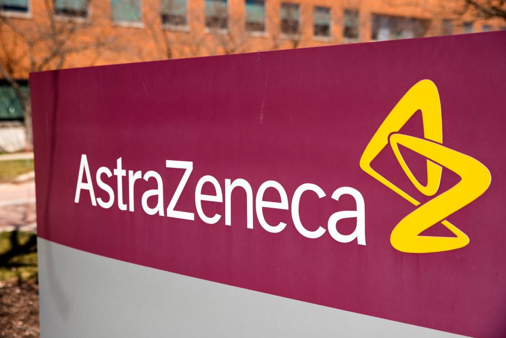 FILE PHOTO: The logo for AstraZeneca is seen outside its North America headquarters in Wilmington, Delaware, U.S., March 22, 2021. REUTERSpix