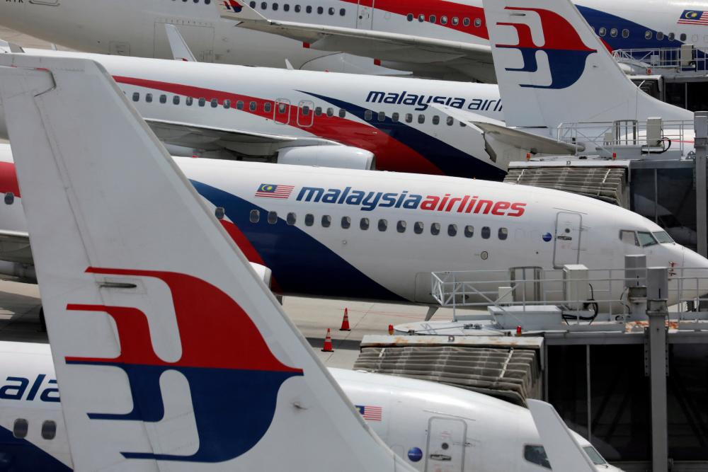 FILE PHOTO: Malaysia Airlines planes parked at Kuala Lumpur International Airport during the coronavirus disease (Covid-19) outbreak in Sepang, Malaysia, October 6, 2020. REUTERSPIX