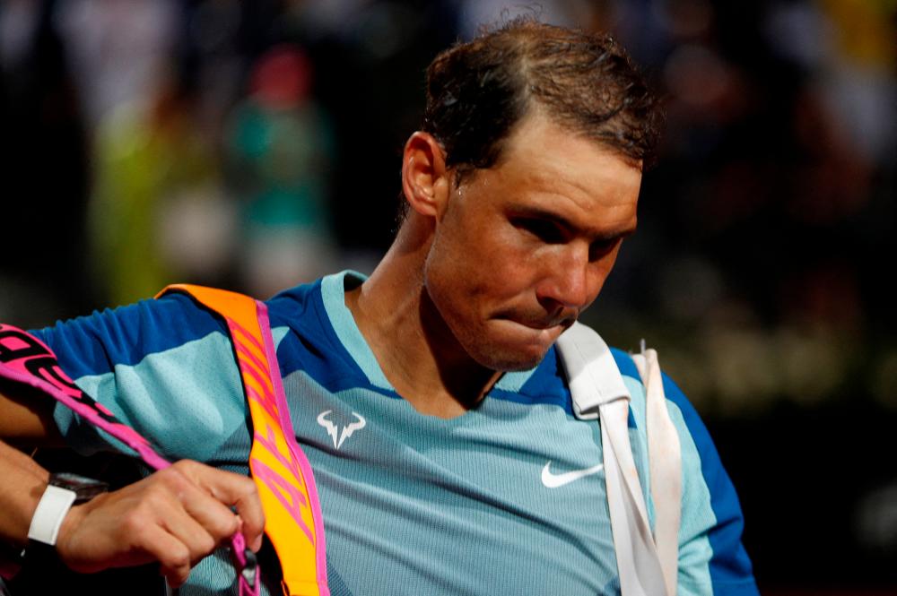 FILE PHOTO: Tennis - ATP Masters 1000 - Italian Open - Foro Italico, Rome, Italy - May 12, 2022 Spain’s Rafael Nadal leaves court after losing his third round match against Canada’s Denis Shapovalov REUTERSPIX