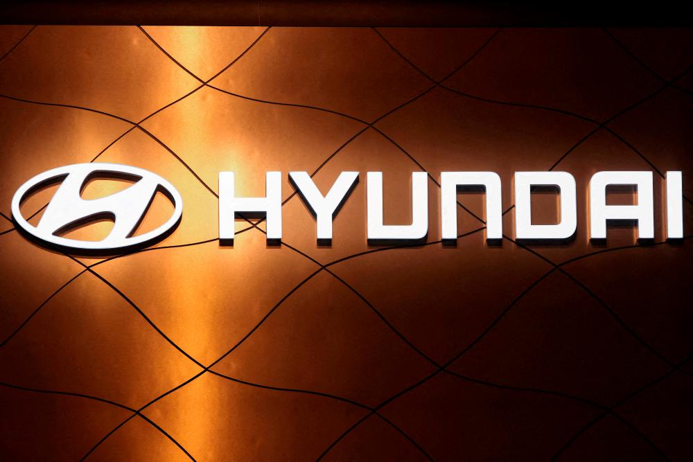 FILE PHOTO: The logo of Hyundai Motor Company is pictured at the New York International Auto Show, in Manhattan, New York City, U.S., April 13, 2022. REUTERSPIX