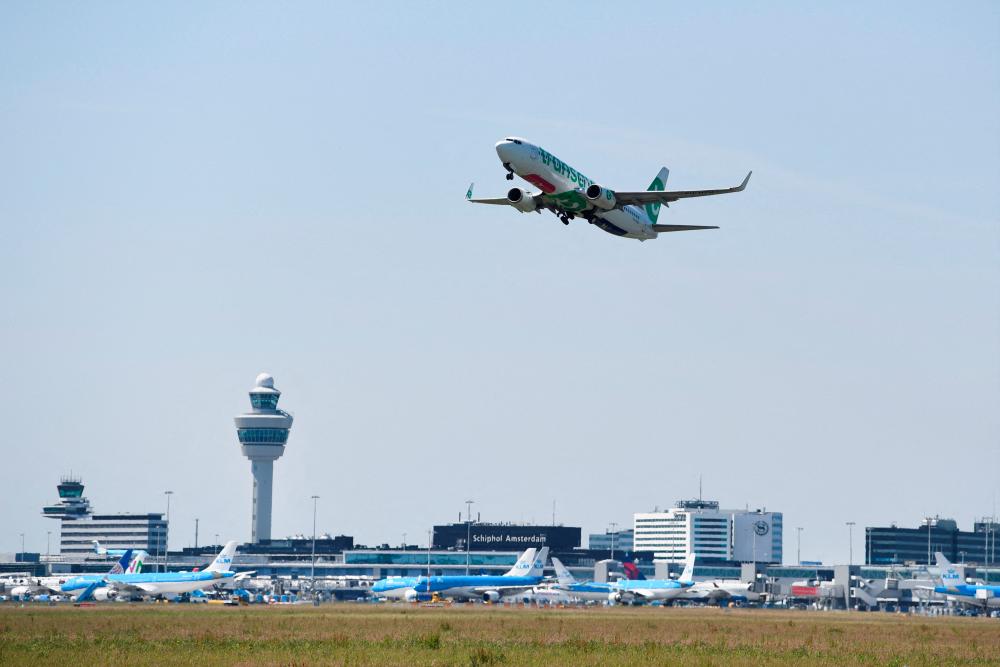 FILE PHOTO: An airplane takes off from Schiphol Airport in Amsterdam, Netherlands June 16, 2022. REUTERSPIX