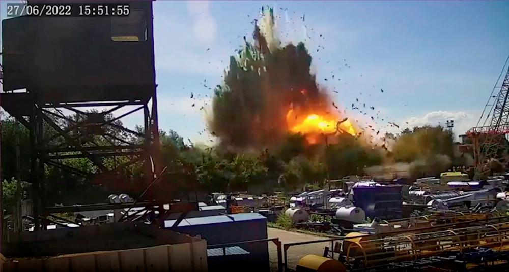 A view of the explosion as a Russian missile strike hits a shopping mall amid Russia's attack on Ukraine, at a location given as Kremenchuk, in Poltava region, Ukraine in this still image taken from handout CCTV footage released June 28, 2022. REUTERSPIX