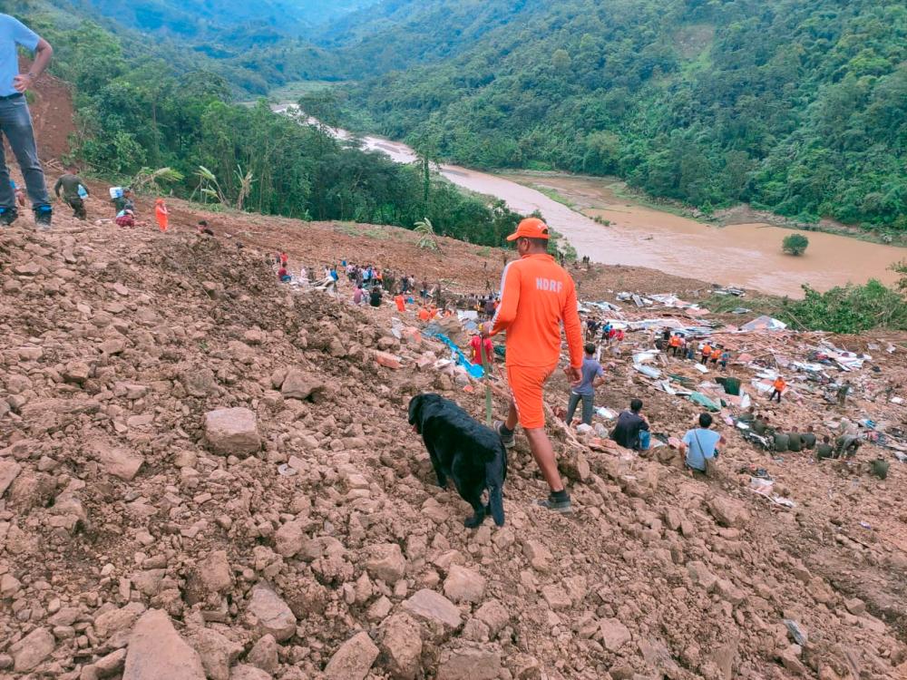 Members of rescue teams search for survivors after a landslide in Noney in the northeastern state of Manipur, India, June 30, 2022. REUTERSPIX