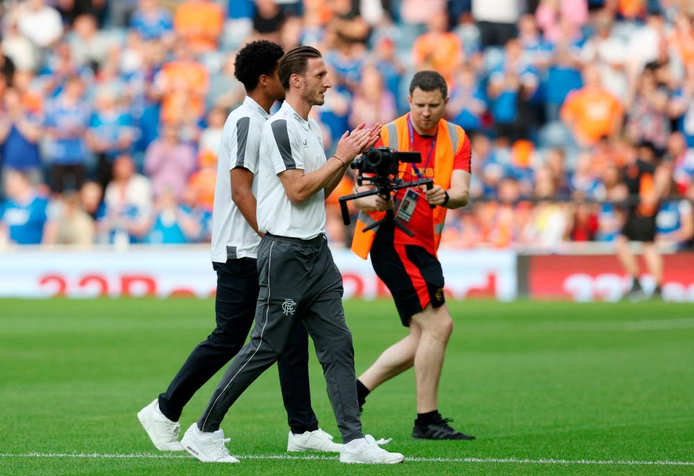Rangers v West Ham United - Ibrox Stadium, Glasgow, Scotland, Britain - July 19, 2022 Rangers present new signing Ben Davies to the crowd before the match/REUTERSPix