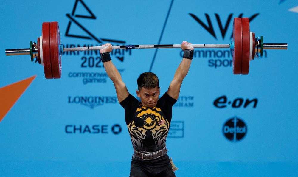 Commonwealth Games - Men's 55kg Weightlifting - Final - The NEC Hall 1, Birmingham, Britain - July 30, 2022Malaysia's Bin Kasdan Mohamad Aniq in action before winning the men's 55kg final and setting a Commonwealth Games record REUTERSpix