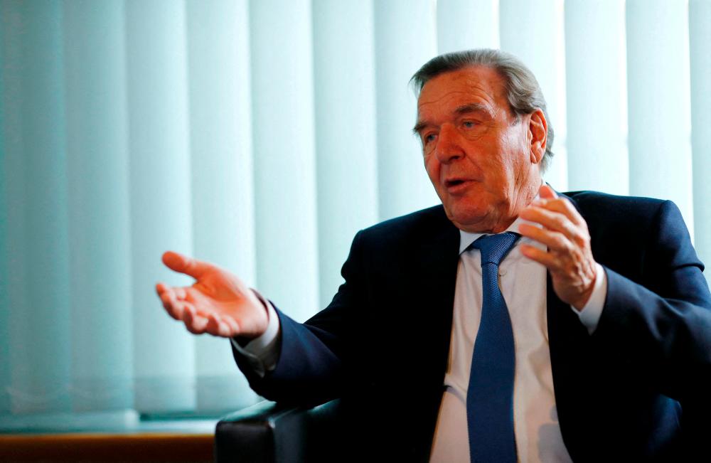 FILE PHOTO: Former German Chancellor Gerhard Schroeder is pictured during an interview with Reuters in his office in Berlin, Germany, November 15, 2018. Picture taken November 15, 2018. REUTERSPIX