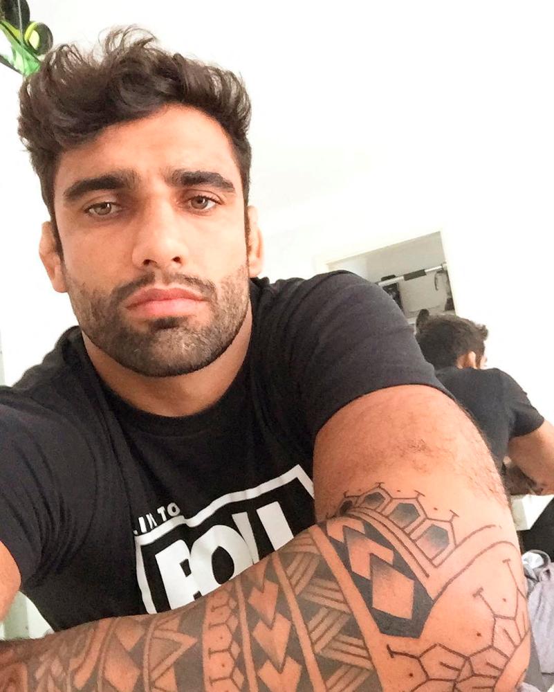 Brazilian Jiu-Jitsu world champion Leandro Lo poses for a selfie in this picture obtained from social media. Instagram/Leandro/REUTERSPIX