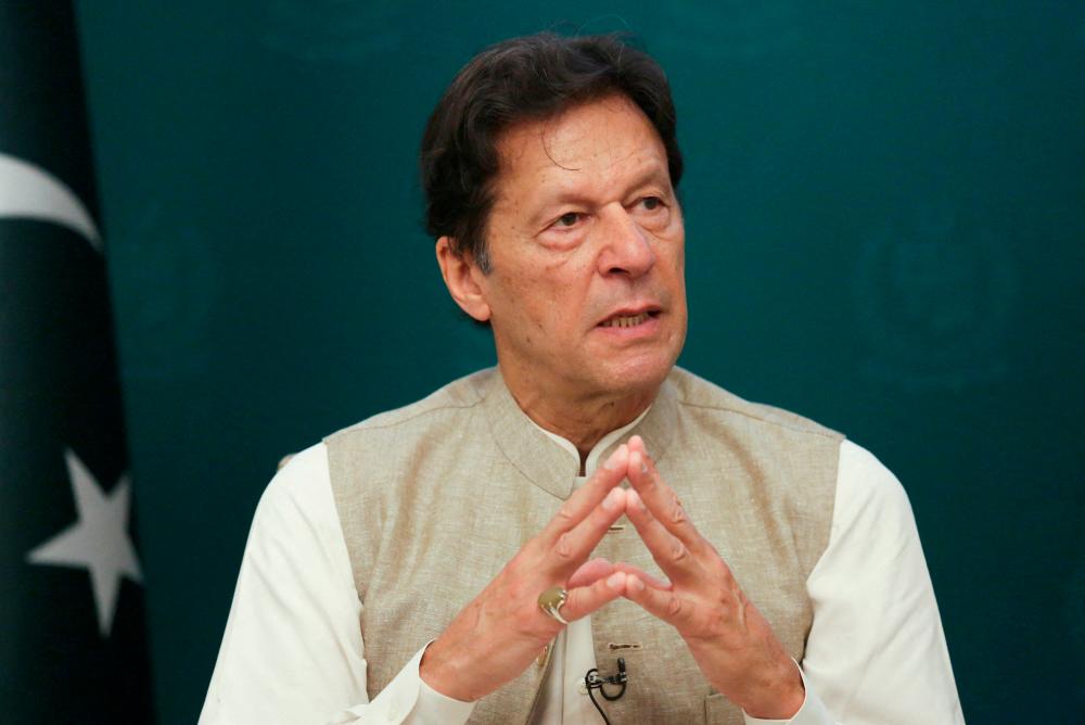 FILE PHOTO: Pakistan’s Prime Minister Imran Khan speaks during an interview with Reuters in Islamabad, Pakistan June 4, 2021. REUTERSPIX