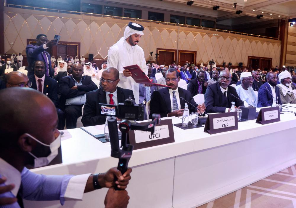 FILE PHOTO: Officials attend a signing agreement for a national dialogue with Chad's transitional military authorities and rebels at Sheraton Hotel in Doha, Qatar August 8, 2022. - REUTERSPIX