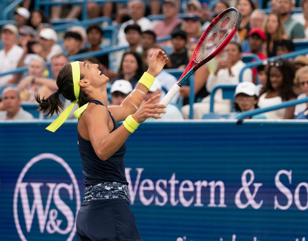 Aug 20, 2022; Cincinnati, OH, USA; Caroline Garcia (FRA) celebrates winning her match against Aryna Sabalenka (BLR) at the Western &amp; Southern Open at the Lindner Family Tennis Center. - REUTERSPIX