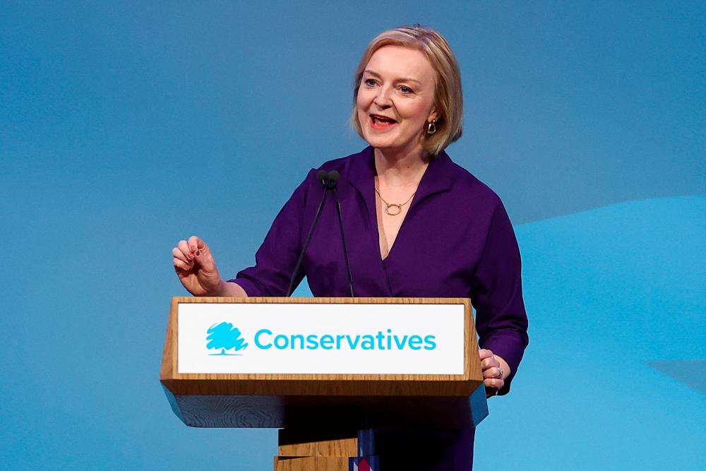 Liz Truss speaks after being announced as Britain's next Prime Minister at The Queen Elizabeth II Centre in London, Britain September 5, 2022. - REUTERSPIX