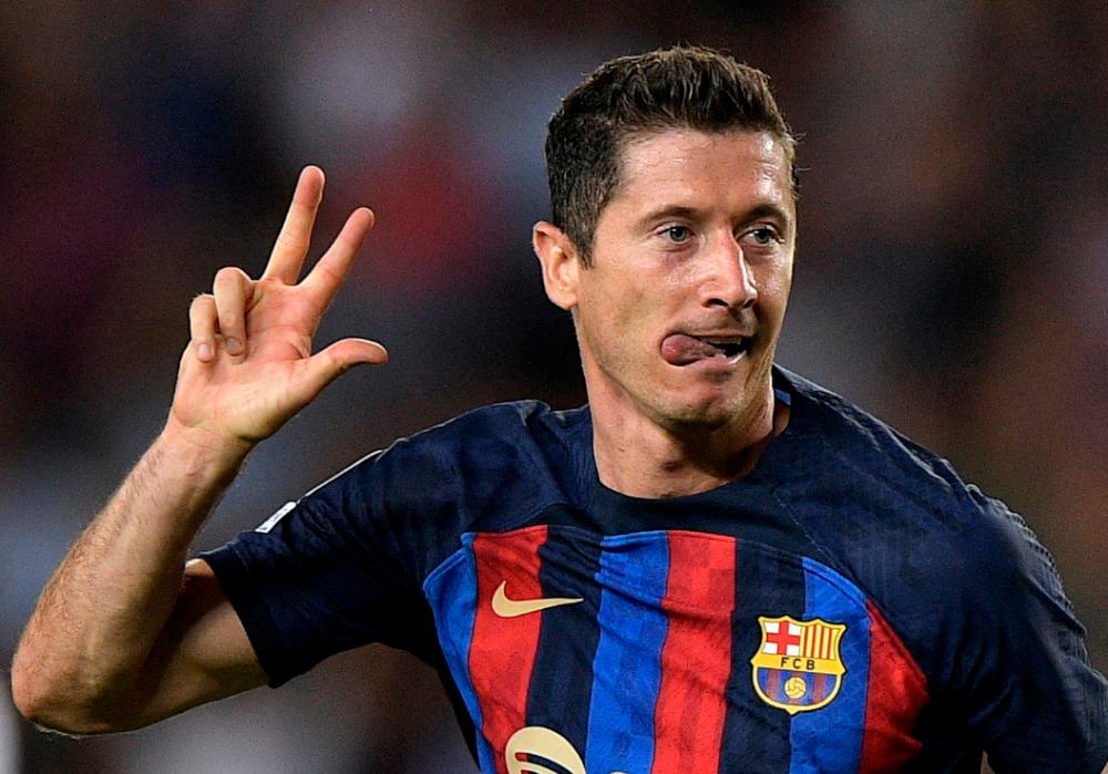 Soccer Football - Champions League - Group C - FC Barcelona v Viktoria Plzen - Camp Nou, Barcelona, Spain - September 7, 2022 FC Barcelona’s Robert Lewandowski celebrates scoring their fourth goal to complete his hat-trick REUTERSPIX