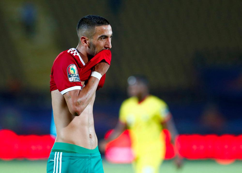 FILE PHOTO: Soccer Football - Africa Cup of Nations 2019 - Round of 16 - Morocco v Benin - Al Salam Stadium, Cairo, Egypt - July 5, 2019 Morocco's Hakim Ziyech looks dejected - REUTERSPIX