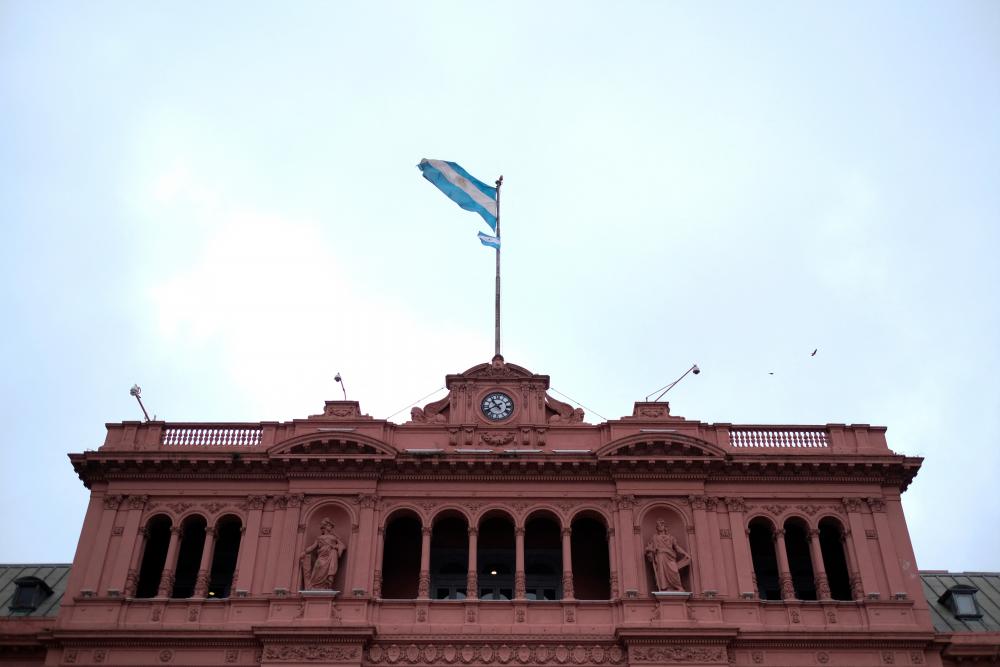 FILE PHOTO: An Argentinian flag waves at the Presidential Palace Casa Rosada in Buenos Aires, Argentina October 29, 2019. - REUTERSPIX