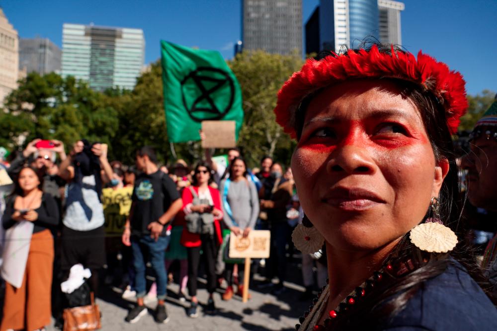 Amazon Indigenous people take part in a Global Climate Strike, to demand governments to take action against global warming, on the sidelines of the 77th Session of the United Nations General Assembly, in New York City, New York, U.S., September 23, 2022. - REUTERSPIX