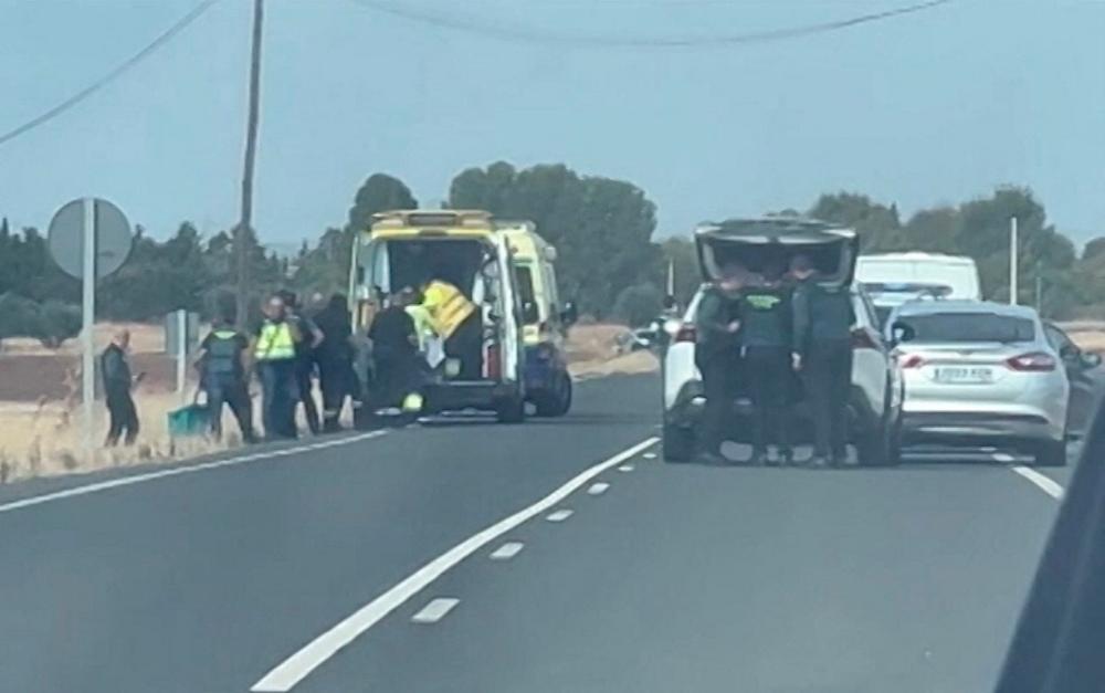 Civil guards and medical staff are deployed after three people were killed and two injured following the intervention of armed police in a shootout sparked by an argument between a man and his father, according to the police, near Ciudad Real, Spain October 26, 2022 in this screengrab taken from video. - REUTERSPIX