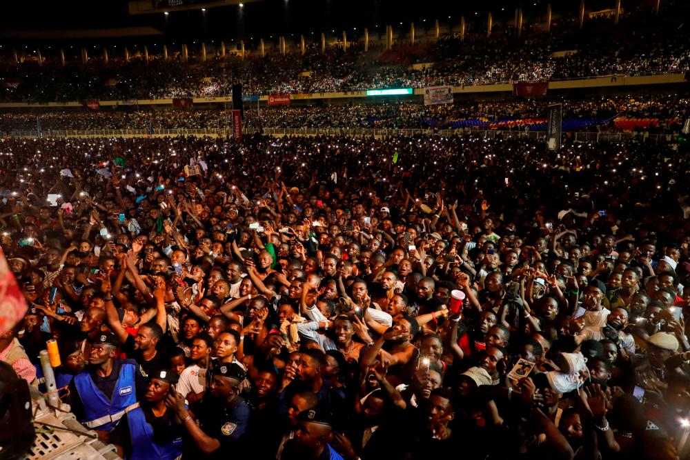 People gather at the concert of the Congolese singer Fally Ipupa, where people were killed, including police officers, in a crush at the overcrowded Martyrs stadium in Kinshasa, Democratic Republic of Congo/AFPPix